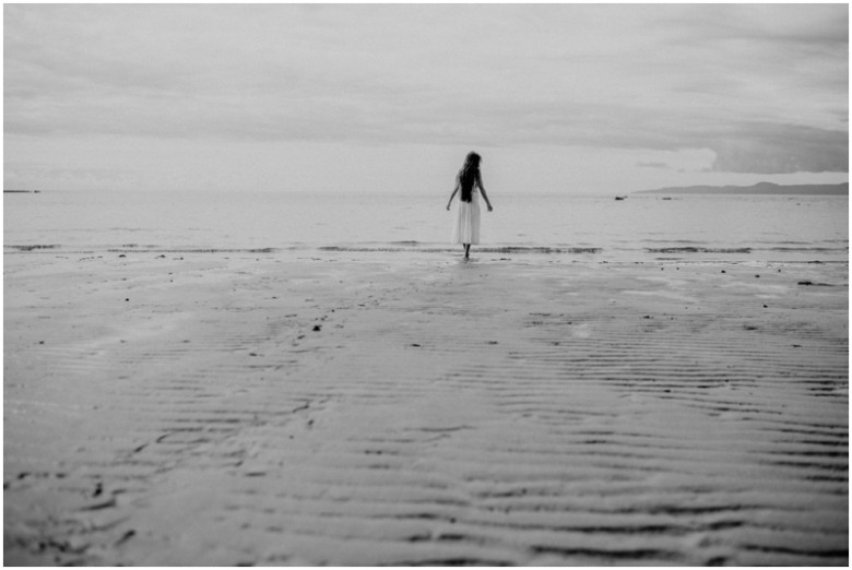 girl walking on a beach