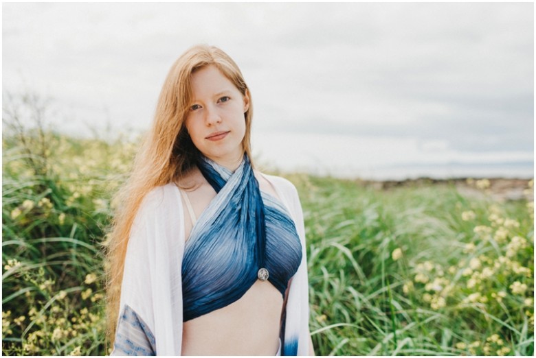 girl in the sand dunes on a beach