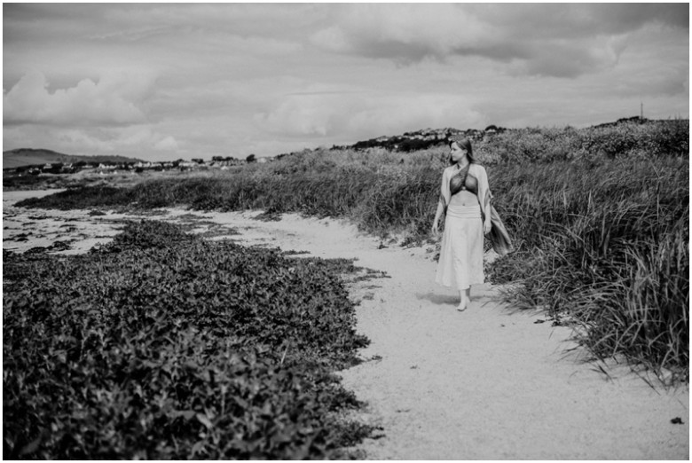 girl in the sand dunes on a beach