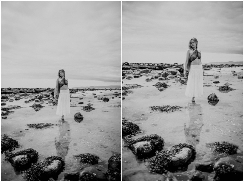 girl standing in the sea at a beach